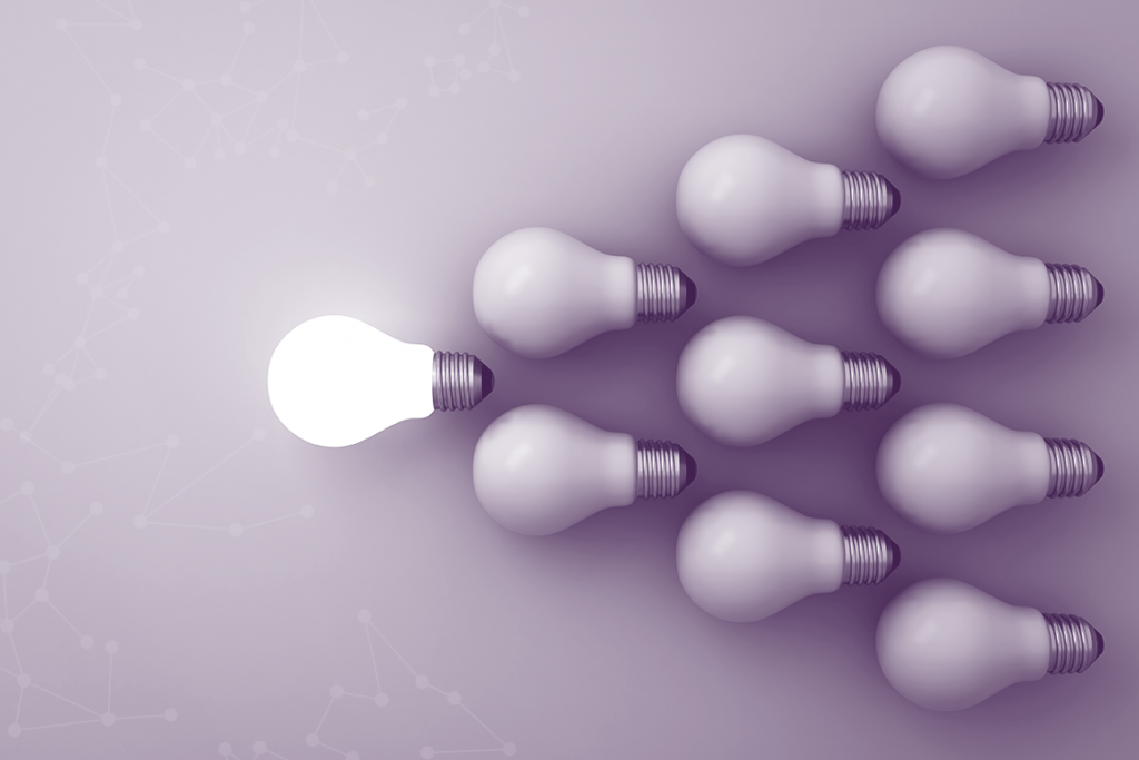 An image of light bulbs with one alight representing finding the best people
